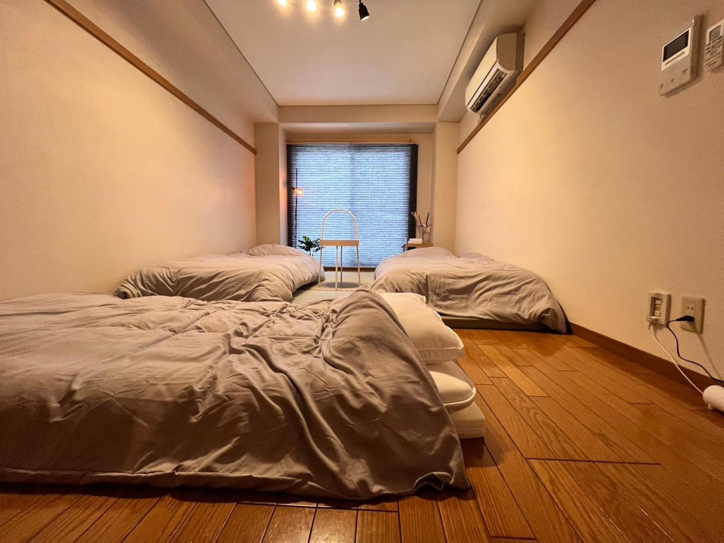 東横のヨコ Lägenhet Okayama Rum bild
